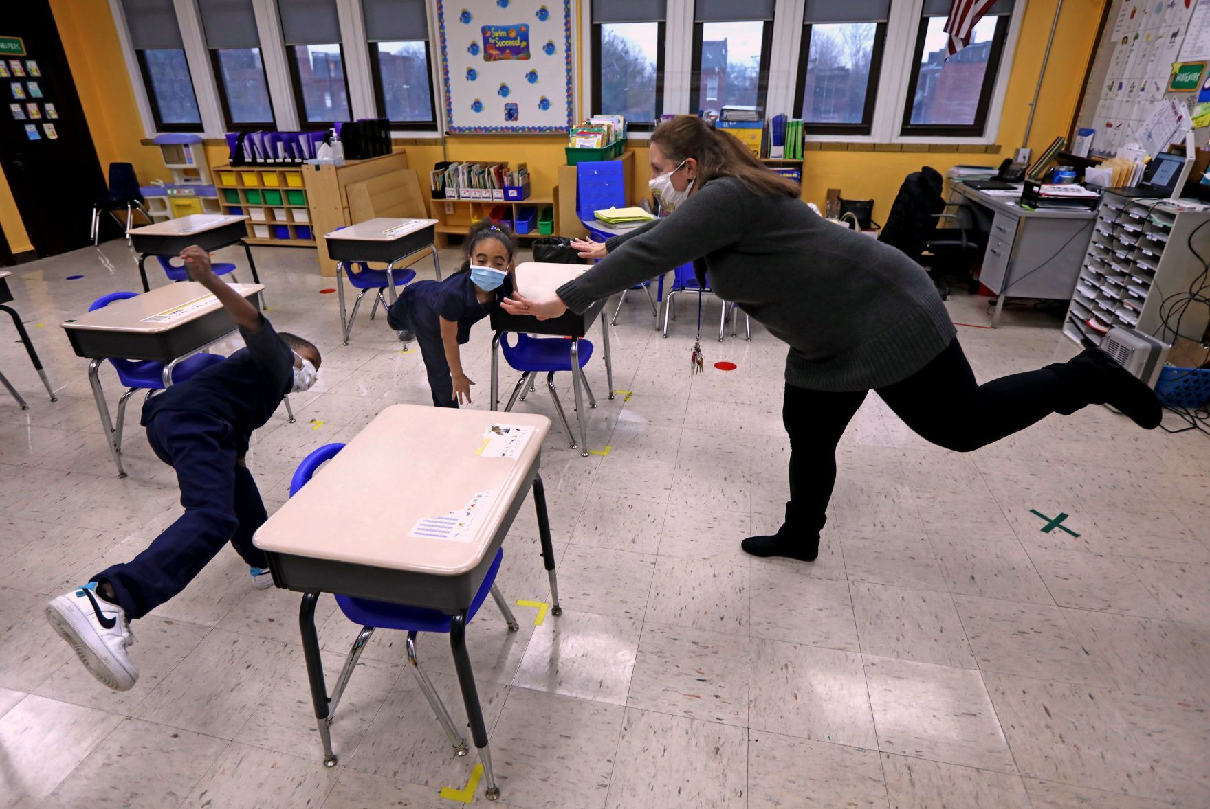 Kindergarteners count to 100 while pretending to be airplanes